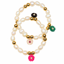 Load image into Gallery viewer, Two Flora pearl bracelets with gold-tone beads and carved flower charms on a white background