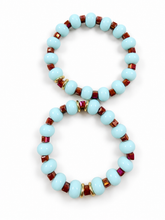 Load image into Gallery viewer, Two coordinating Brisa Escarlata bracelets on white background; sold individually