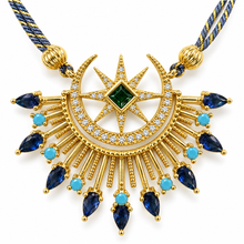 Cargar imagen en el visor de la galería, Celestia by Selig & Co. Close-up of blue cubic zirconia moon and star pendant. White background.