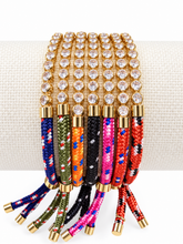Load image into Gallery viewer, Siete colores de pulseras de cordón con zirconias y baño de oro 18K