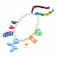 Cargar imagen en el visor de la galería, Beach Stuff pearl necklace with colorful summer charms and cord ties on a white background