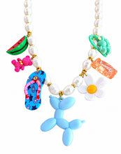 Cargar imagen en el visor de la galería, Alternate close-up of Beach Stuff pearl necklace with colorful beach charms on white