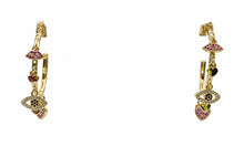 Cargar imagen en el visor de la galería, Alternate view of Charm Karma gold-tone hoop earrings with lips, heart and crystal eye charms on white