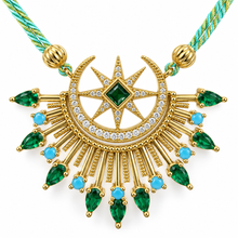 Cargar imagen en el visor de la galería, Celestia by Selig &amp; Co. Close-up of green cubic zirconia moon and star pendant. White background.
