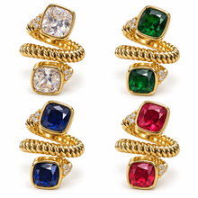 Cargar imagen en el visor de la galería, Four adjustable 18K gold-plated spiral rings on white in clear, green, blue and raspberry pink
