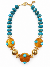 Load image into Gallery viewer, Mar de Miel turquoise-blue and honey-colored beaded necklace on white background
